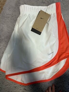 Nike Women’s White and Coral Athletic Running Shorts